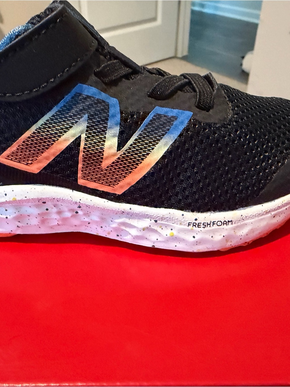New Balance Kids Black Sneakers with Rainbow Gradient 'N' Accent